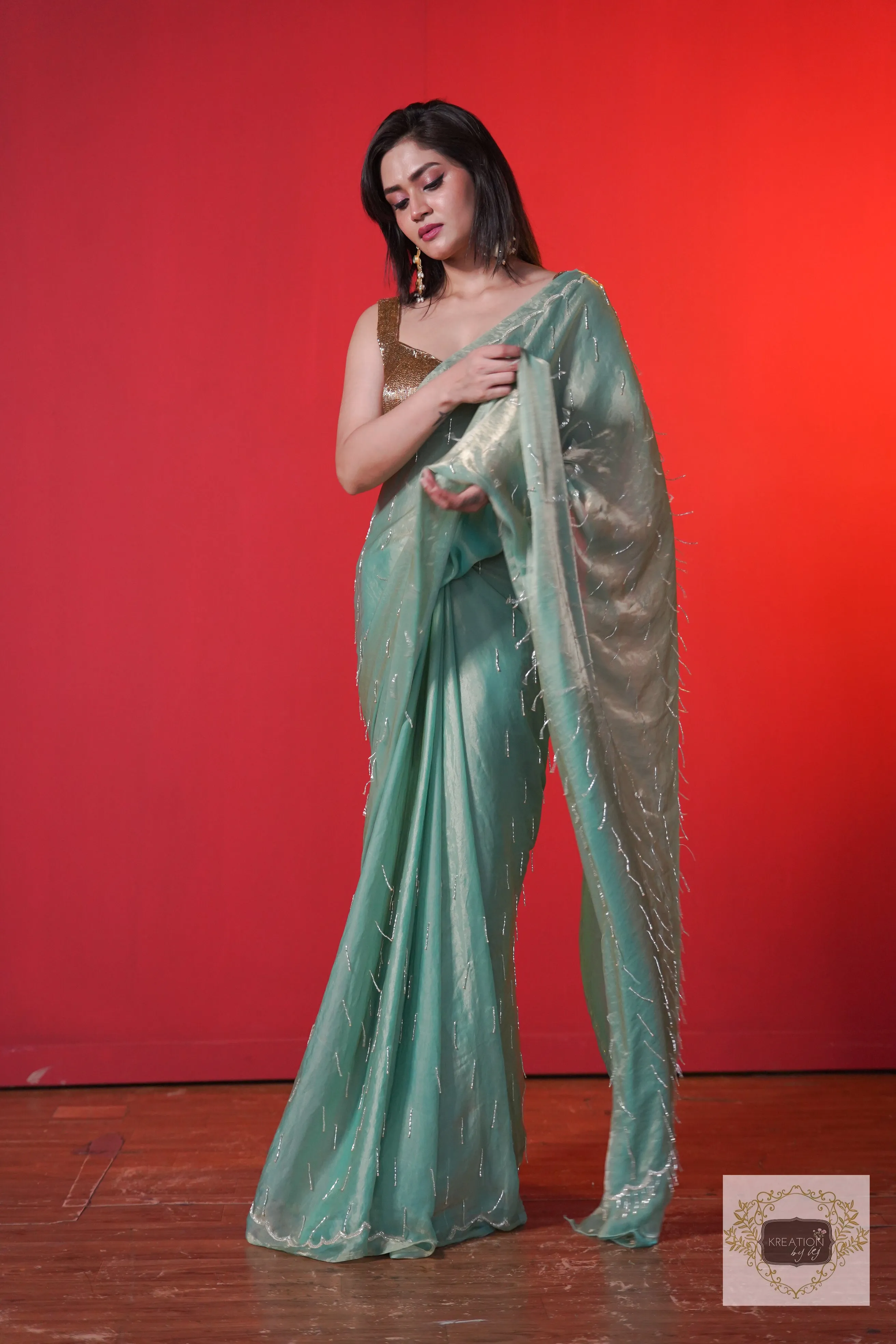 Chammak Challo Pastel Green Shimmer Satin Saree