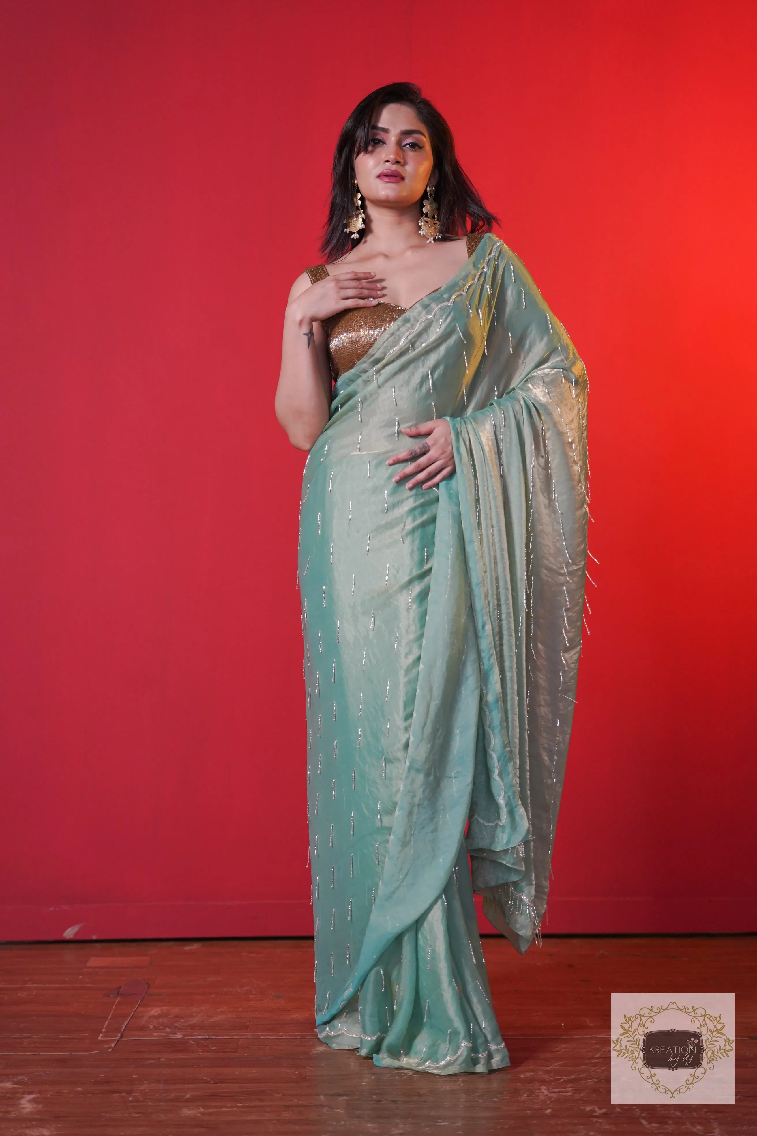 Chammak Challo Pastel Green Shimmer Satin Saree