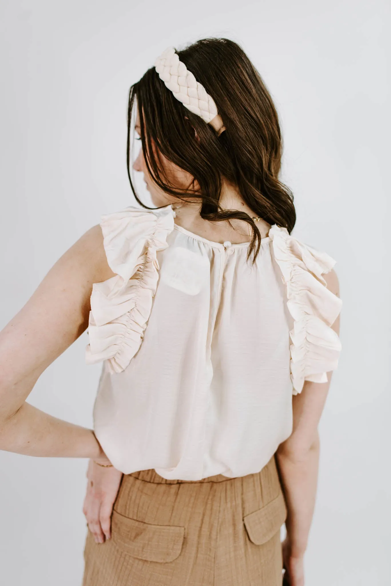 So It Goes Sleeveless Ruffle Blouse