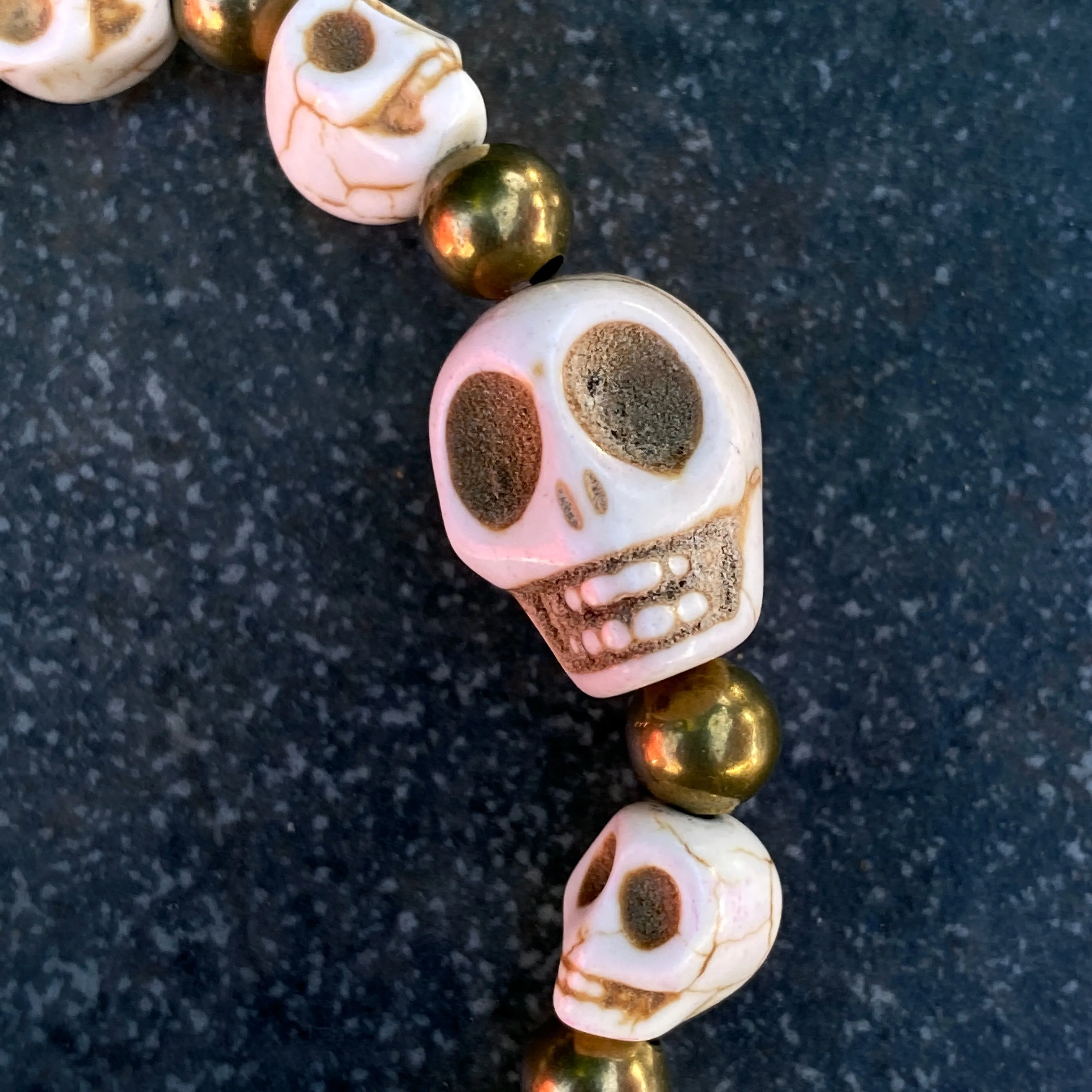 White Howlite Skull and Brass Beaded Bracelet